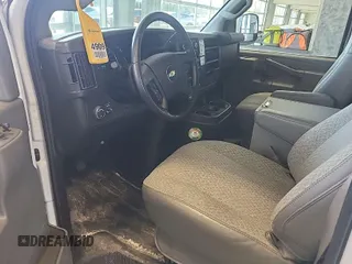 2021 Chevrolet Express Cargo Van with VIN 1GCWGAFP4M1303136, listed as a IAAI auction lot 41990274 with 133,702 mi miles. Bid and sale history available at carsss.com. Image 1.