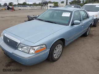 2005 Mercury Grand Marquis GS with VIN 2MEFM74W45X629662, listed as a IAAI auction lot 42075152 with 65,941 mi miles. Bid and sale history available at carsss.com. Image 2.