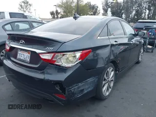 2014 Hyundai Sonata Limited with VIN 5NPEC4AB0EH818164, listed as a IAAI auction lot 42061434 with 120,228 mi miles and . Bid and sale history available at DreamBid. Image 4.