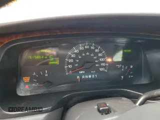 2001 Lincoln Town Car Executive z VIN 1LNHM81W11Y647756, wystawiony jako Copart lot #54741135 z przebiegiem 191 580 mil mil oraz Szkoda całkowita • Salvage title. Historia ofert i sprzedaży dostępna na DreamBid. Obrazek 9.