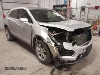 2020 Cadillac XT5 Premium Luxury AWD with VIN 1GYKNDRS4LZ166523, listed as a IAAI auction lot 41118646 with 72,216 mi miles. Bid and sale history available at carsss.com. Image 1.