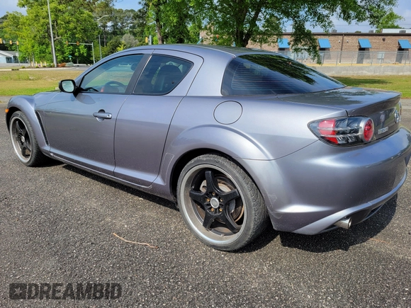 2004 Mazda RX-8 with VIN JM1FE173040113082, listed as a IAAI auction lot 42122741 with 62,483 mi miles. Bid and sale history available at carsss.com. Image 4.