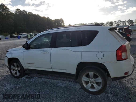 2012 Jeep Compass Latitude with VIN 1C4NJCEA2CD666392, listed as a Copart auction lot 77044444 with 175,283 mi miles and Salvage Title. Bid and sale history available at DreamBid. Image 2.