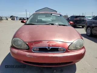 1997 Mercury Sable GS z VIN 1MELM50U6VG652538, wystawiony jako Copart lot #73302644 z przebiegiem 138 637 mil mil oraz Szkody całkowita. Historia ofert i sprzedaży dostępna na DreamBid. Obrazek 5.
