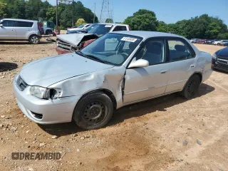2001 Toyota Corolla CE with VIN 2T1BR12E21C464797, listed as a Copart auction lot 61240855 with 96,836 mi miles and Salvage title. Bid and sale history available at DreamBid. Image 1.