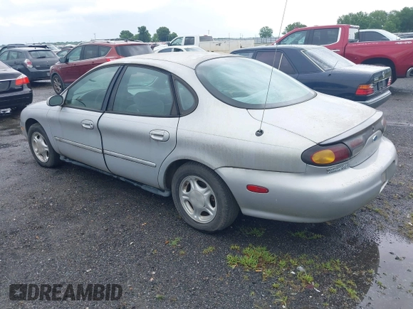 1997 Ford Taurus GL z VIN 1FALP52UXVG180596, wystawiony jako IAAI lot #42463461 z przebiegiem 190 419 mil mil oraz . Historia ofert i sprzedaży dostępna na DreamBid. Obrazek 3.