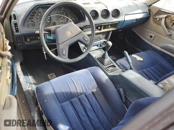 1981 Datsun 280ZX z VIN JN1HZ04S2BX413331, wystawiony jako Copart lot #50431235 z przebiegiem 98 237 mil mil oraz Tytuł czysty. Historia ofert i sprzedaży dostępna na DreamBid. Obrazek 8.