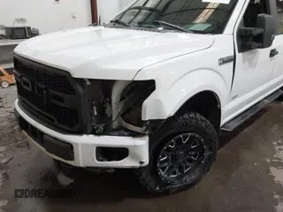 2016 Ford F-150 XLT with VIN 1FTEW1EP3GKE25825, listed as a IAAI auction lot 41254806 with 140,971 mi miles. Bid and sale history available at carsss.com. Image 6.