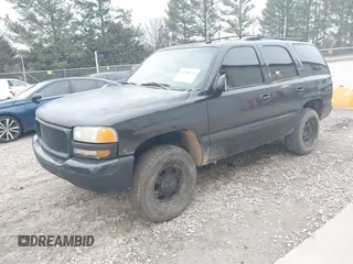 2003 GMC Yukon SLT with VIN 1GKEC13ZX3R181111, listed as a IAAI auction lot 41496338 with 307,996 mi miles. Bid and sale history available at carsss.com. Image 2.