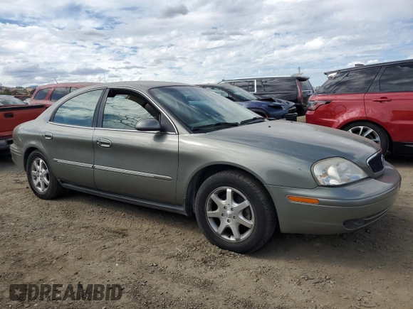 2001 Mercury Sable LS with VIN 1MEFM53U21G623749, listed as a Copart auction lot 72206684 with 97,044 mi miles and Salvage title. Bid and sale history available at DreamBid. Image 4.