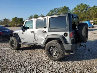 2013 Jeep Wrangler Unlimited Sport with VIN 1C4BJWDG2DL642935, listed as a Copart auction lot 85652394 with 196,547 mi miles and Salvage Title. Bid and sale history available at carsss.com. Image 2.