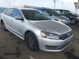 2015 Volkswagen Passat 1.8T Limited Edition with VIN 1VWAT7A34FC077021, listed as a IAAI auction lot 42090573 with 230,465 mi miles. Bid and sale history available at carsss.com. Image 1.