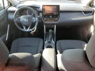2022 Toyota Corolla Cross LE with VIN 7MUCAAAG0NV010646, listed as a Copart auction lot 72151744 with 59,273 mi miles and Salvage title. Bid and sale history available at DreamBid. Image 8.