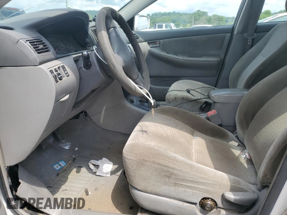 2007 Toyota Corolla CE with VIN JTDBR32E770101863, listed as a Copart auction lot 56990185 with 258,559 mi miles and Clean title. Bid and sale history available at DreamBid. Image 7.