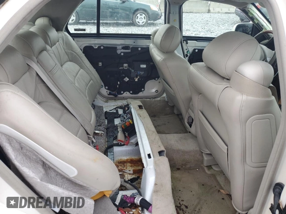 2000 Cadillac DeVille DTS z VIN 1G6KF5797YU263599, wystawiony jako Copart lot #81576484 z przebiegiem 118 414 mil mil oraz Szkoda całkowita • Salvage title. Historia ofert i sprzedaży dostępna na DreamBid. Obrazek 10.