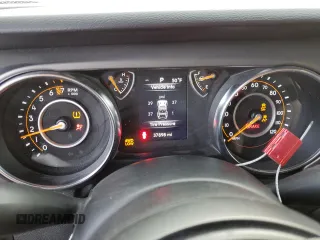 2022 Jeep Wrangler Unlimited High Tide with VIN 1C4HJXDG5NW107100, listed as a Copart auction lot 83231044 with 37,898 mi miles and Salvage Title. Bid and sale history available at DreamBid. Image 9.