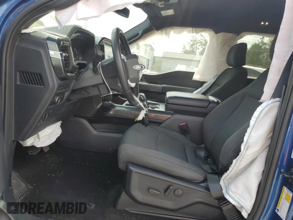 2022 Ford F-150 XL with VIN 1FTFW1E82NFB84178, listed as a Copart auction lot 52036065 with 18,382 mi miles and Salvage Title. Bid and sale history available at DreamBid. Image 7.