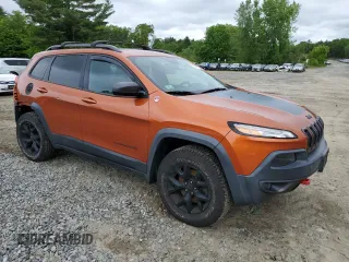 2016 Jeep Cherokee Trailhawk with VIN 1C4PJMBS2GW255368, listed as a Copart auction lot 59010305 with 105,667 mi miles and Salvage title. Bid and sale history available at DreamBid. Image 4.