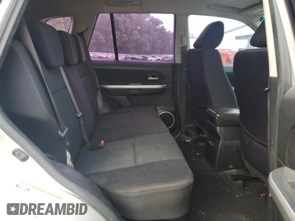 2006 Suzuki Grand Vitara z VIN JS3TE941764101657, wystawiony jako Copart lot #54943205 z przebiegiem 206 744 mil mil oraz Szkody całkowita. Historia ofert i sprzedaży dostępna na DreamBid. Obrazek 11.