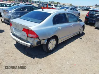 2007 Honda Civic with VIN JHMFA36257S021635, listed as a IAAI auction lot 42315202 with 233,394 mi miles and . Bid and sale history available at DreamBid. Image 4.