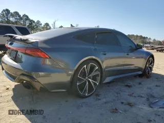 2022 Audi RS 7 z VIN WUAPCBF22NN912345, wystawiony jako Copart lot #41202044 z przebiegiem 5076 mil mil oraz Szkody całkowita. Historia ofert i sprzedaży dostępna na DreamBid. Obrazek 3.