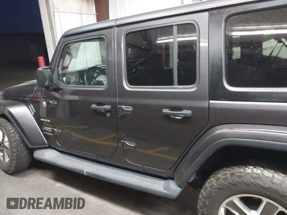 2019 Jeep Wrangler Unlimited Sahara с VIN 1C4HJXEN8KW588369, выставлен на аукционе IAAI как лот 42581061 с пробегом 90 710 миль миль и . История ставок и продаж доступна на DreamBid. Изображение 15.
