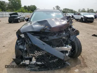 2025 Mazda CX-70 with VIN JM3KJDHD4S1115855, listed as a Copart auction lot 60230865 with 5,899 mi miles and Salvage title. Bid and sale history available at DreamBid. Image 5.