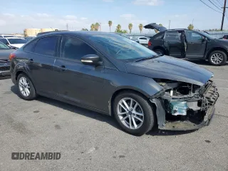 2017 Ford Focus SE with VIN 1FADP3F25HL300155, listed as a Copart auction lot 61685025 with 93,317 mi miles and Salvage title. Bid and sale history available at DreamBid. Image 4.