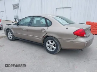 2002 Ford Taurus SES Standard with VIN 1FAFP55U52G135781, listed as a IAAI auction lot 41520037 with 196,207 mi miles. Bid and sale history available at carsss.com. Image 3.