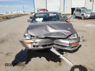 1994 Toyota Camry LE z VIN JT2GK12E2R0050878, wystawiony jako Copart lot #46878005 z przebiegiem 152 211 mil mil oraz Szkoda całkowita • Salvage title. Historia ofert i sprzedaży dostępna na DreamBid. Obrazek 5.