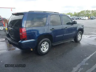 2008 Chevrolet Tahoe LS with VIN 1GNFC13C08R122594, listed as a IAAI auction lot 42239106 with 236,861 mi miles and . Bid and sale history available at DreamBid. Image 4.