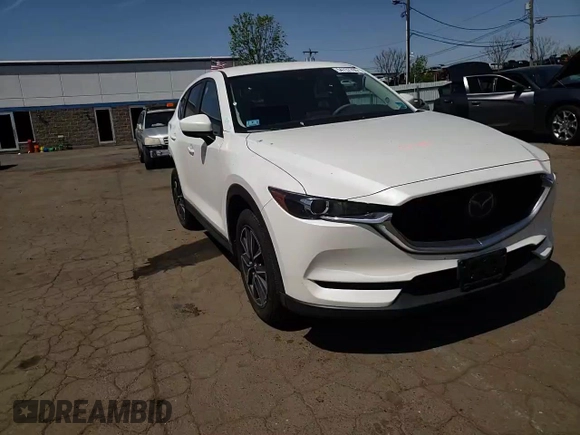2018 Mazda CX-5 Touring with VIN JM3KFBCMXJ0389773, listed as a Copart auction lot 54737795 with 82,103 mi miles and Salvage Title. Bid and sale history available at DreamBid. Image 13.