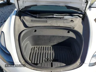 2021 Tesla Model 3 Standard Range Plus with VIN 5YJ3E1EA7MF089997, listed as a Copart auction lot 81528284 with 147,242 mi miles and Clean Title. Bid and sale history available at DreamBid. Image 12.