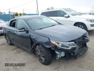 2020 Kia Optima LX z VIN 5XXGT4L37LG389290, wystawiony jako IAAI lot #39286726 z przebiegiem 84 538 mil mil oraz . Historia ofert i sprzedaży dostępna na DreamBid. Obrazek 1.