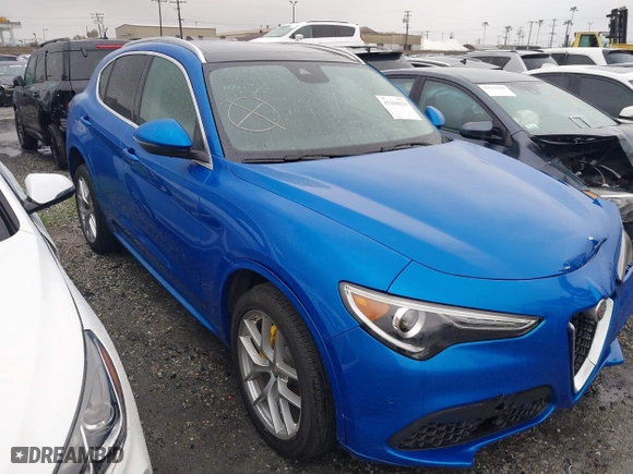 2021 Alfa Romeo Stelvio Ti with VIN ZASPAKBN0M7D18611, listed as a IAAI auction lot 41104626 with 30,188 mi miles. Bid and sale history available at carsss.com. Image 1.
