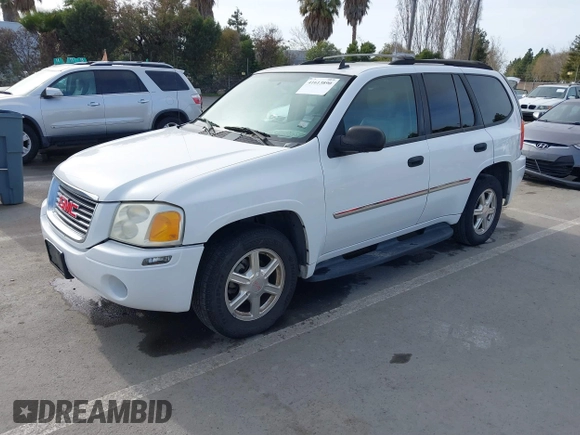 2008 GMC Envoy SLE1 with VIN 1GKDS13S482171739, listed as a IAAI auction lot 41613890 with 233,268 mi miles and . Bid and sale history available at DreamBid. Image 2.
