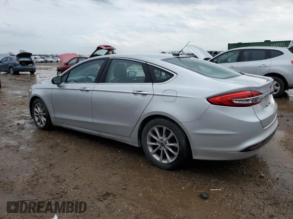 2017 Ford Fusion SE with VIN 3FA6P0HDXHR124355, listed as a Copart auction lot 51341715 with 99,984 mi miles and Salvage Title. Bid and sale history available at DreamBid. Image 2.