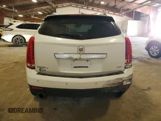 2015 Cadillac SRX Luxury Collection z VIN 3GYFNEE33FS641781, wystawiony jako Copart lot #50765905 z przebiegiem Nie podano mil oraz Szkody całkowita. Historia ofert i sprzedaży dostępna na DreamBid. Obrazek 6.