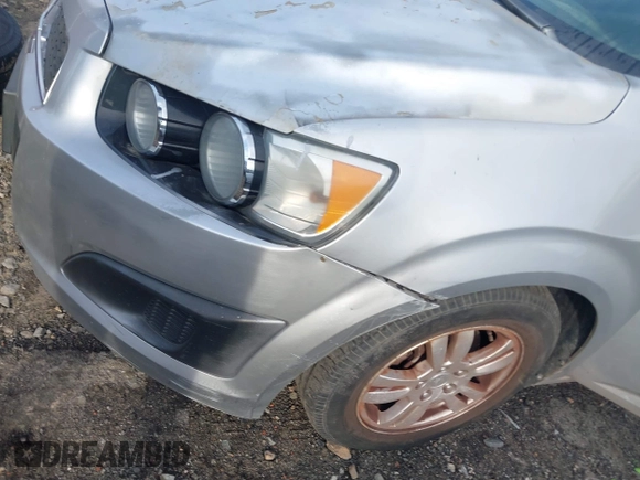 2013 Chevrolet Sonic LT with VIN 1G1JC5SH1D4205197, listed as a IAAI auction lot 41623803 with 153,666 mi miles and . Bid and sale history available at DreamBid. Image 13.