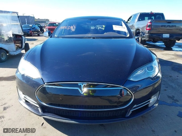 2013 Tesla Model S with VIN 5YJSA1CN5DFP23692, listed as a IAAI auction lot 41337490 with 128,000 mi miles. Bid and sale history available at carsss.com. Image 12.
