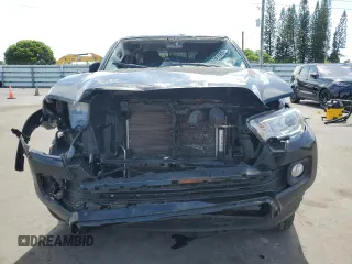 2023 Toyota Tacoma SR z VIN 3TYCZ5ANXPT136237, wystawiony jako Copart lot #62584345 z przebiegiem 32 674 mil mil oraz Szkoda całkowita • Salvage title. Historia ofert i sprzedaży dostępna na DreamBid. Obrazek 5.