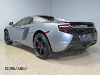 2016 McLaren 650S z VIN SBM11FAA1GW006061, wystawiony jako Copart lot #73406814 z przebiegiem 16 999 mil mil oraz Szkody całkowita. Historia ofert i sprzedaży dostępna na DreamBid. Obrazek 4.