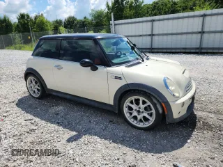 2006 MINI Hardtop S with VIN WMWRE33556TJ38543, listed as a Copart auction lot 62420145 with 105,656 mi miles and Salvage title. Bid and sale history available at DreamBid. Image 4.
