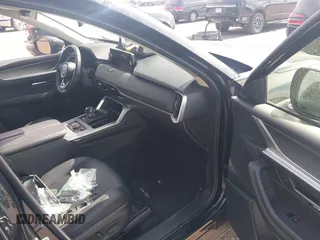 2024 Mazda CX-90 Premium z VIN JM3KKDHD4R1141475, wystawiony jako IAAI lot #41813198 z przebiegiem 30 352 mil mil oraz . Historia ofert i sprzedaży dostępna na DreamBid. Obrazek 5.