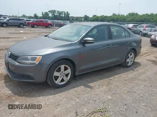2012 Volkswagen Jetta TDI w/Premium & Nav with VIN 3VWLL7AJ7CM120526, listed as a IAAI auction lot 42494136 with 149,202 mi miles and . Bid and sale history available at DreamBid. Image 2.