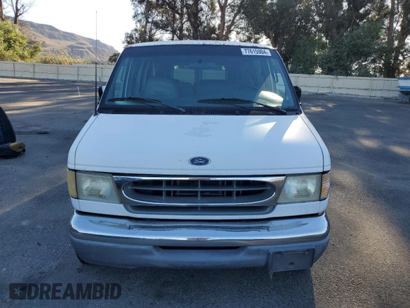 2000 Ford Econoline Passenger XL with VIN 1FBSS31L3YHB98619, listed as a Copart auction lot 77615904 with 316,815 mi miles and Clean Title. Bid and sale history available at DreamBid. Image 5.