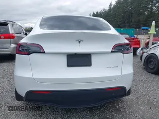 2023 Tesla Model Y Long Range z VIN 7SAYGAEEXPF647352, wystawiony jako IAAI lot #41955933 z przebiegiem Nie podano mil oraz . Historia ofert i sprzedaży dostępna na DreamBid. Obrazek 17.