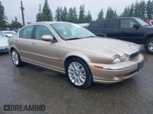 2003 Jaguar X-Type 2.5L Manual z VIN SAJEA51D53XC94089, wystawiony jako IAAI lot #42370566 z przebiegiem 81 687 mil mil oraz . Historia ofert i sprzedaży dostępna na DreamBid. Obrazek 1.