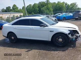 2014 Ford Police Interceptor with VIN 1FAHP2MKXEG100925, listed as a IAAI auction lot 42491379 with 97,937 mi miles and . Bid and sale history available at DreamBid. Image 14.