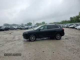 2019 Jeep Cherokee Altitude with VIN 1C4PJMLX5KD386597, listed as a Copart auction lot 59132655 with 129,243 mi miles and Salvage title. Bid and sale history available at DreamBid. Image 14.